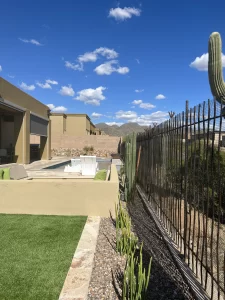 Secure backyard with a durable snake fence to keep rattlesnakes out.