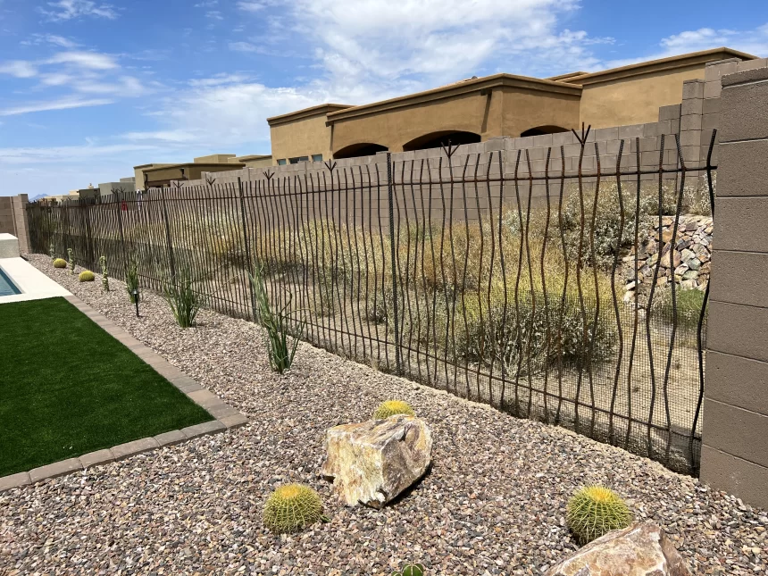 Rattlesnake-proof snake fence installed in a backyard.