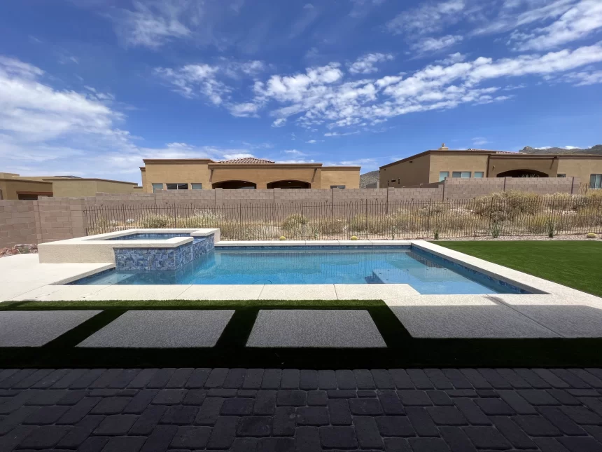 Snake fence installed to protect pool area from rattlesnakes.