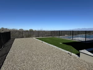 Child-safe yard with a snake fence protecting against rattlesnakes.