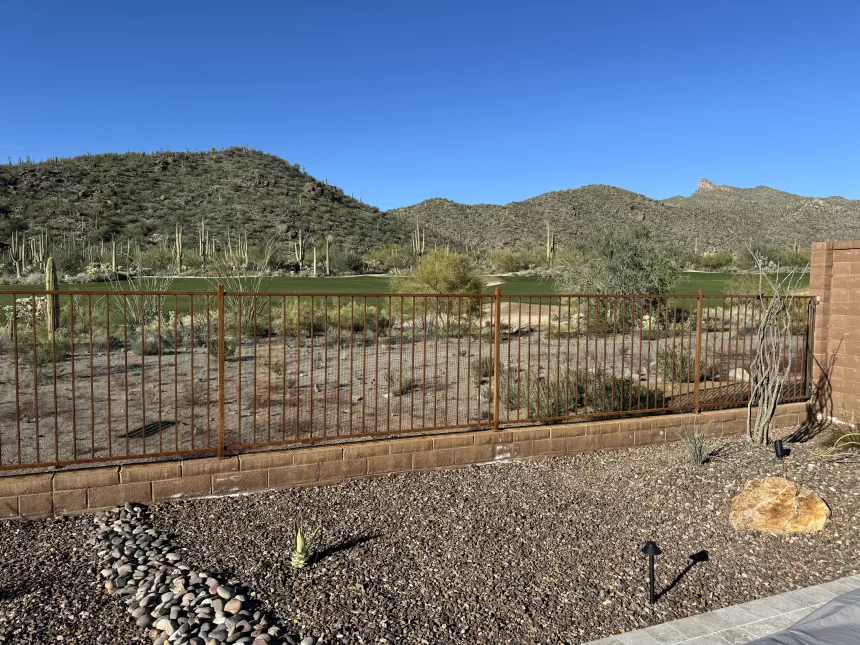 Custom snake fence designed to block rattlesnakes in desert areas.